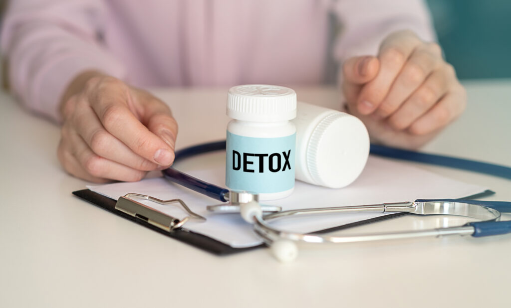 doctor’s desk with “Detox” bottle, stethoscope, and clipboard—benzodiazepine detox guidance in Spokane, Washington State (WA) and Spokane Valley