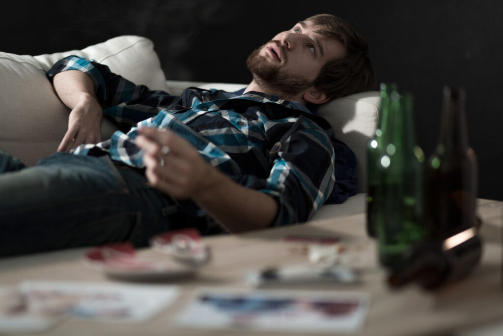 Severe amphetamine effects showing a young man experiencing drug misuse and exhaustion in Spokane, Washington State.
