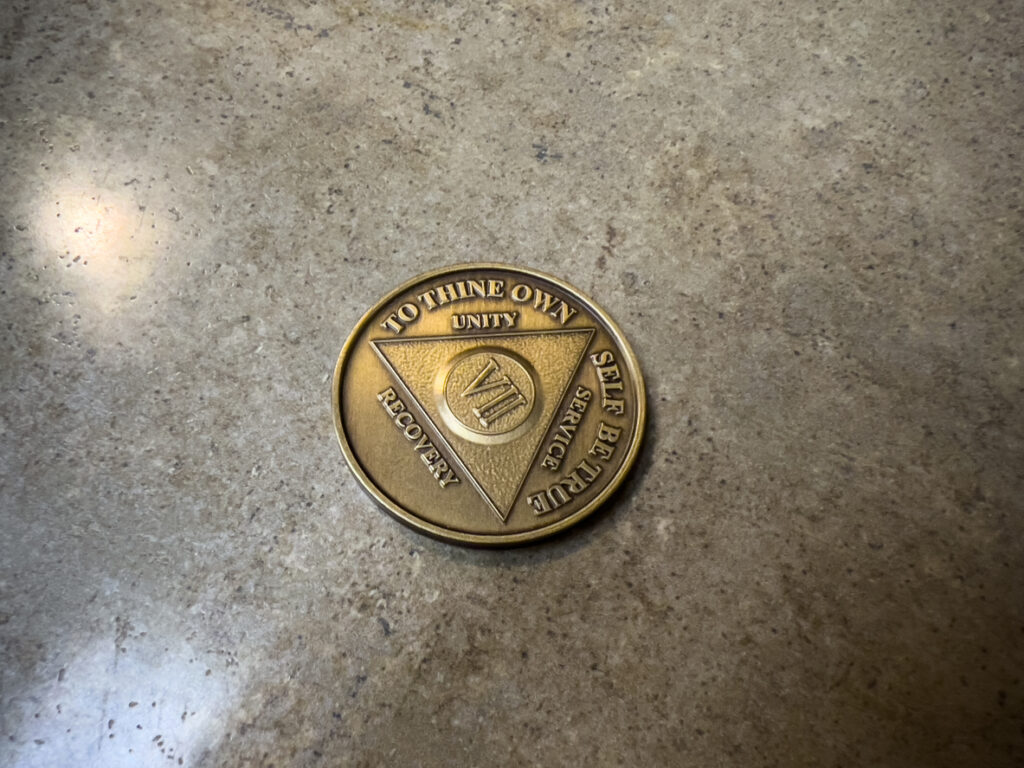 Bronze 12 Step Program sobriety coin symbolizing recovery, unity, and service in Spokane WA