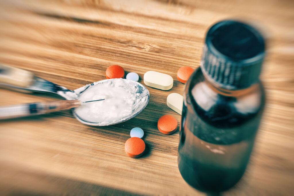 Small amber bottle representing poppers drug awareness and safety education in Spokane WA