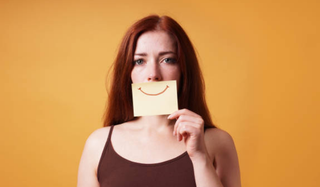  People with smiling depression often go unnoticed or misjudged because they have learned to mask their true feelings behind a smile, making it difficult for others to recognize their internal struggles.