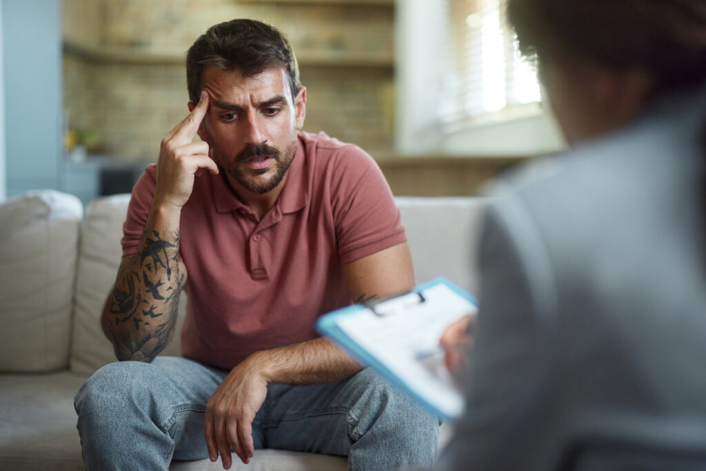 Man talking with a therapist during Men’s Mental Health Month counseling session in Spokane WA