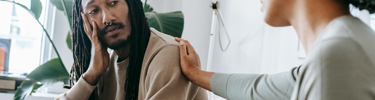 A patient and staff member talking during an inpatient mental health treatment. 