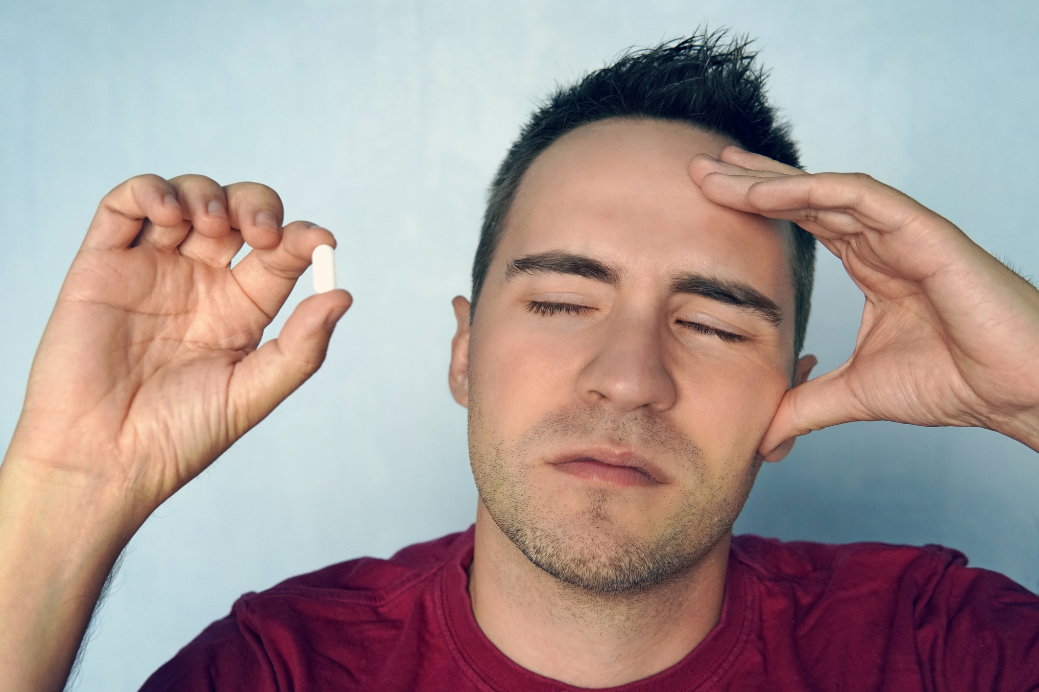 man taking zoloft pill for anxiety disorder treatment in washington state
