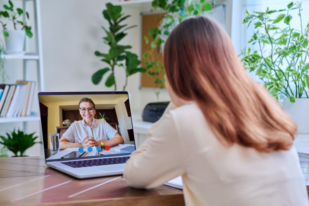 Woman attending an online depression counseling session with a therapist via video call in Spokane WA