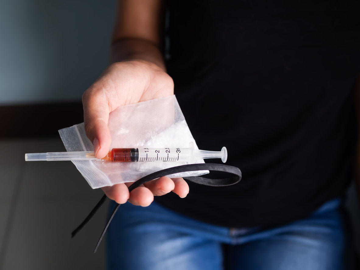 person holding syringe spokane valley washington