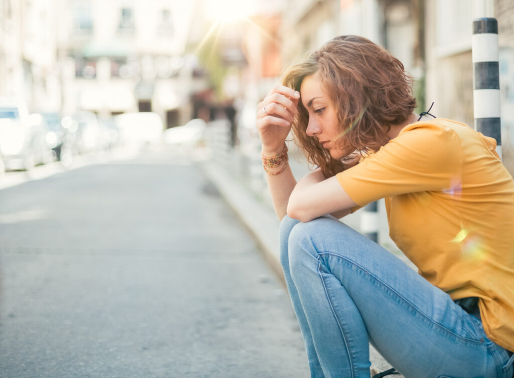 woman sitting outside having anxious spokane valley washington